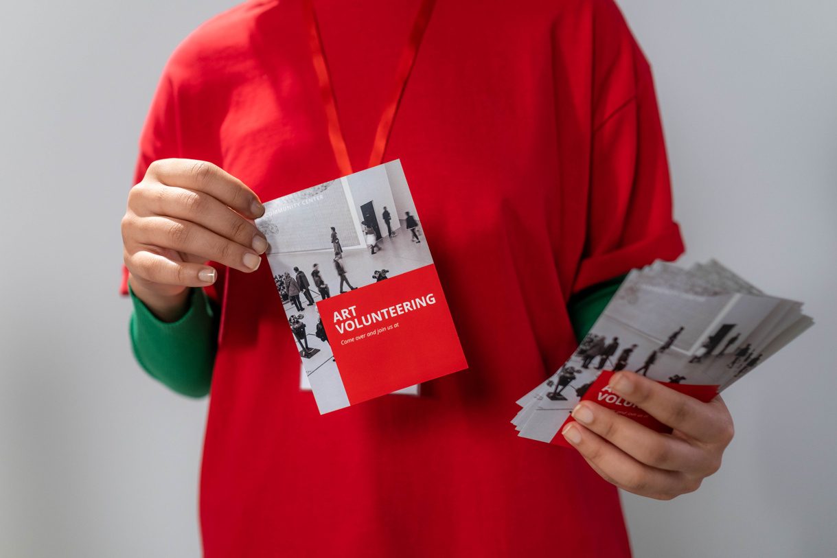 Close-up Photo of Red Brochure